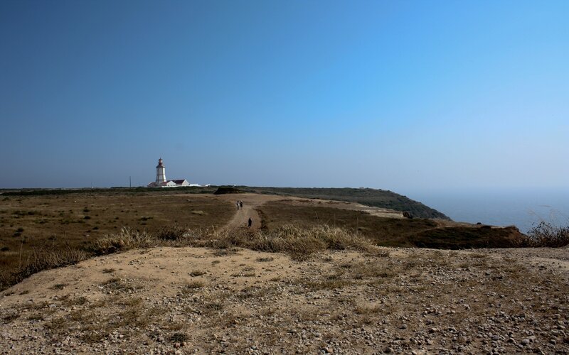 Lighthouse on Coastal Cliff — Blue