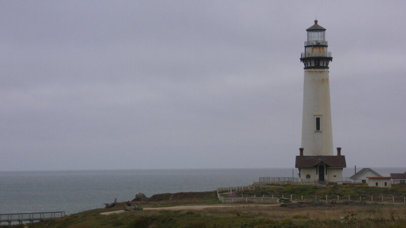 Lighthouse on Coastal Cliff — Gray