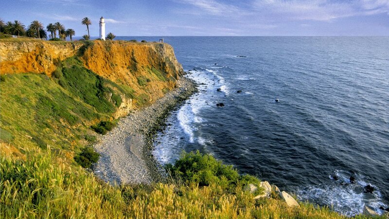 Lighthouse on Coastal Cliff — Serene