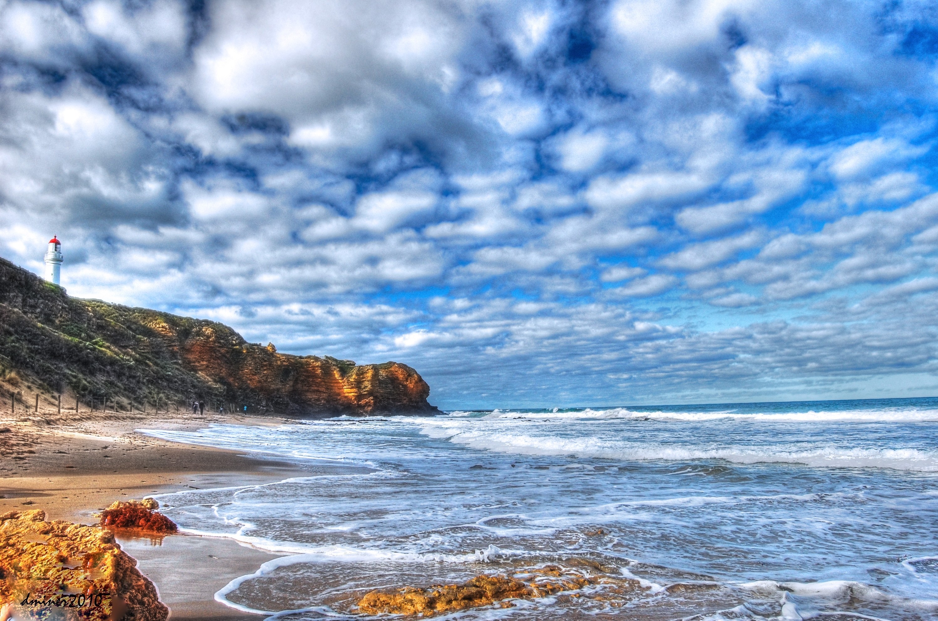Lighthouse on coastal cliffs