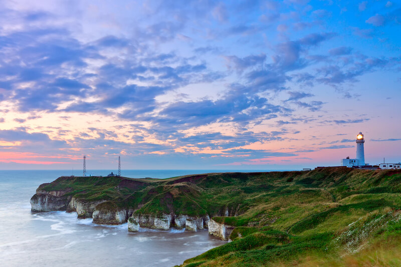 Lighthouse on Coastal Cliffs — Blue, Serene