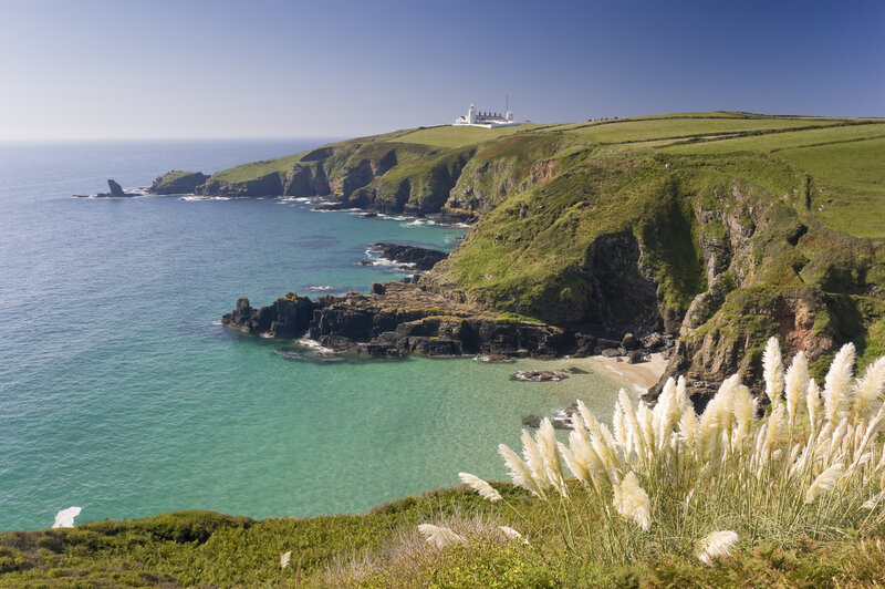 Lighthouse on Coastal Cliffs — Green