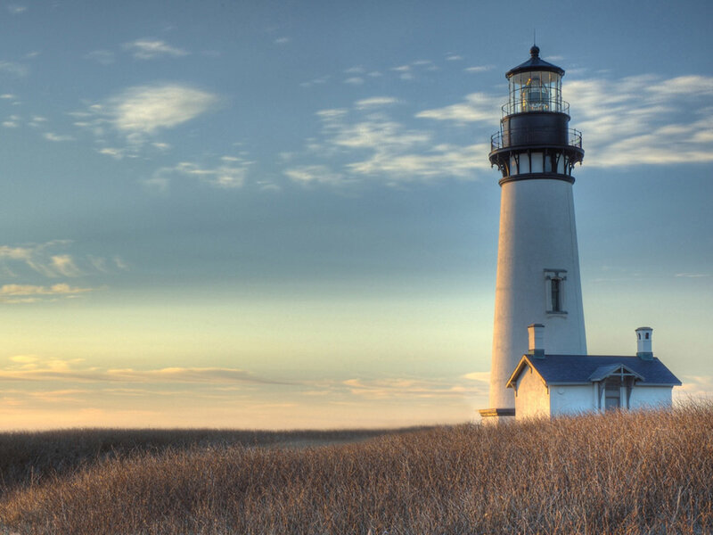 Lighthouse on Coastal Dune — Blue, Serene, Sunset, Photograph