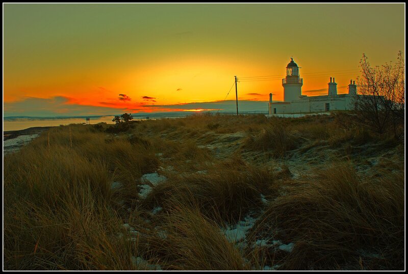 Lighthouse on Coastal Dunes