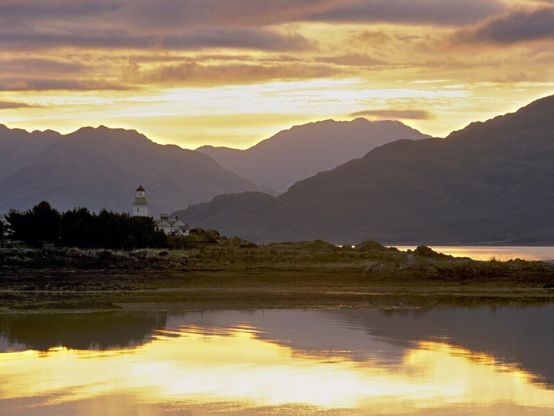 Lighthouse on Coastal Hill — Yellow, Serene