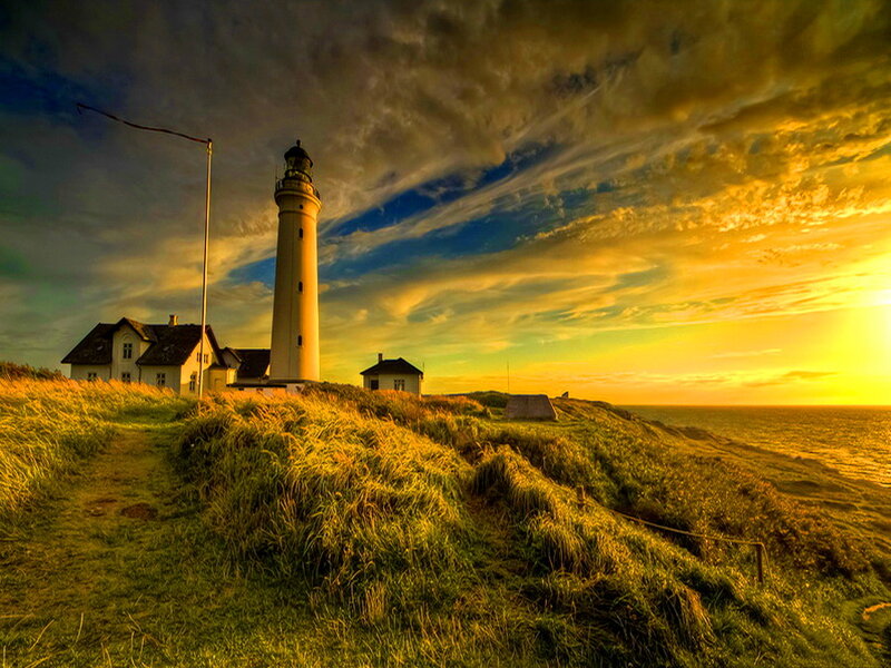 Lighthouse on Coastal Hill — Yellow