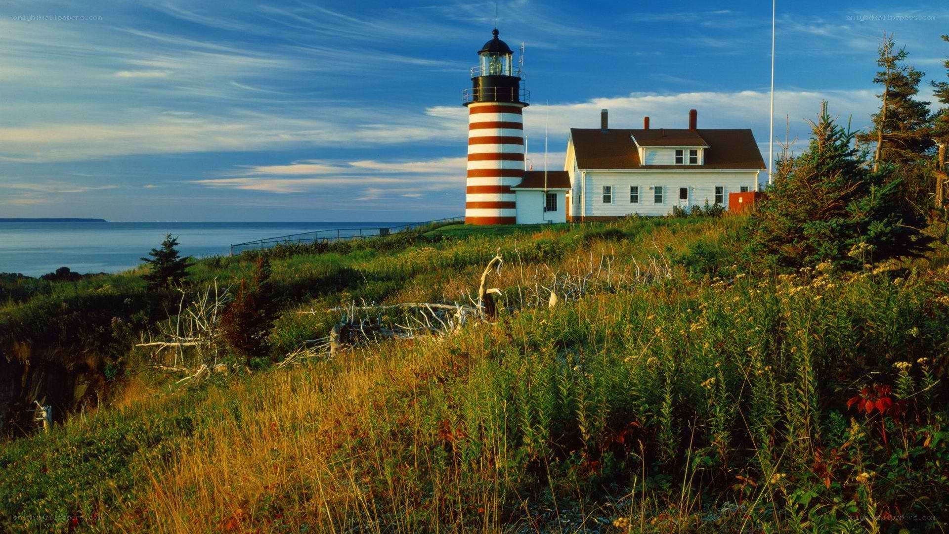 lighthouse on coastal hill