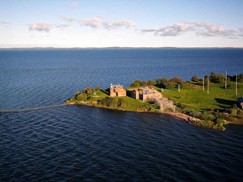 lighthouse on coastal peninsula