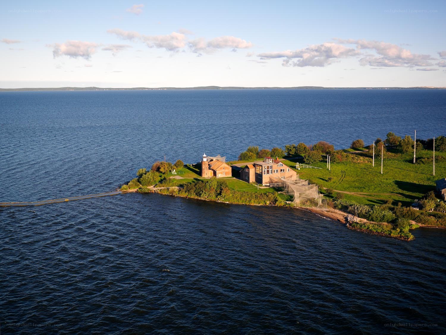 lighthouse on coastal peninsula