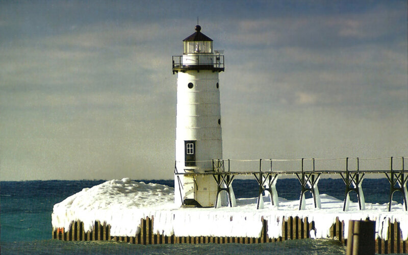 Lighthouse on Icy Pier