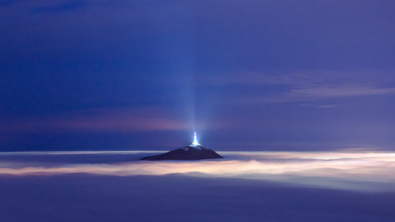 Lighthouse on Mountain Peak