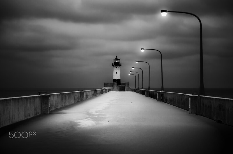 Lighthouse on Pier — Black, Dramatic, Night, Photograph, Streetlights