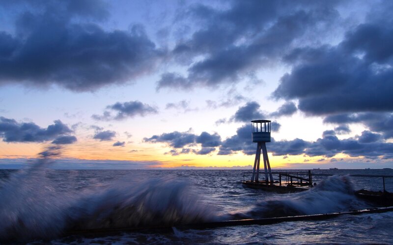 Lighthouse on Pier — Blue, Dramatic, Sunset, Photograph, Ocean, Clouds