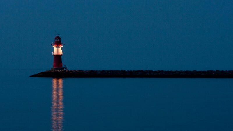 Lighthouse on Pier — Blue, Serene, Night, Photograph, Water