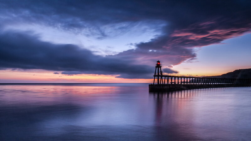 Lighthouse on Pier — Blue, Serene, Sunset, Photograph