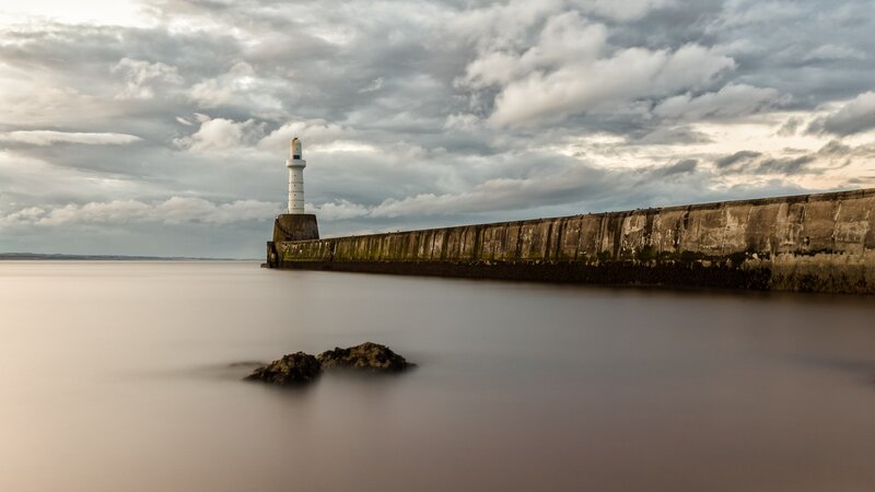 Lighthouse on Pier — Gray, Dramatic, Sunset, Photograph, Clouds