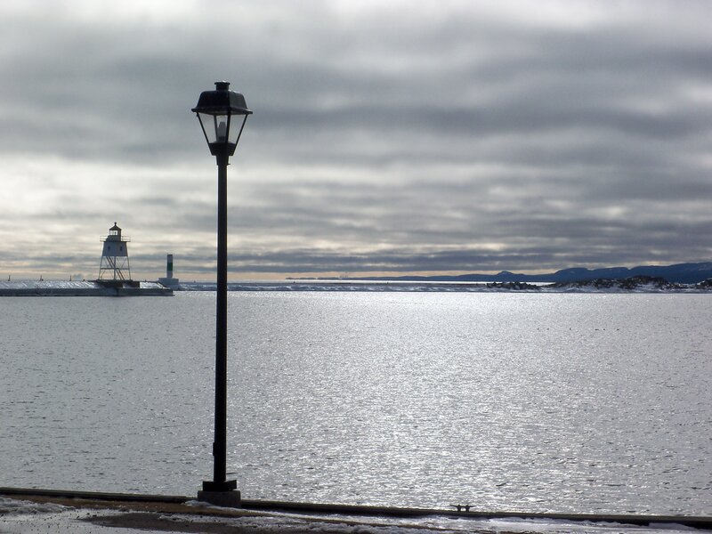 Lighthouse on Pier — Gray, Overcast