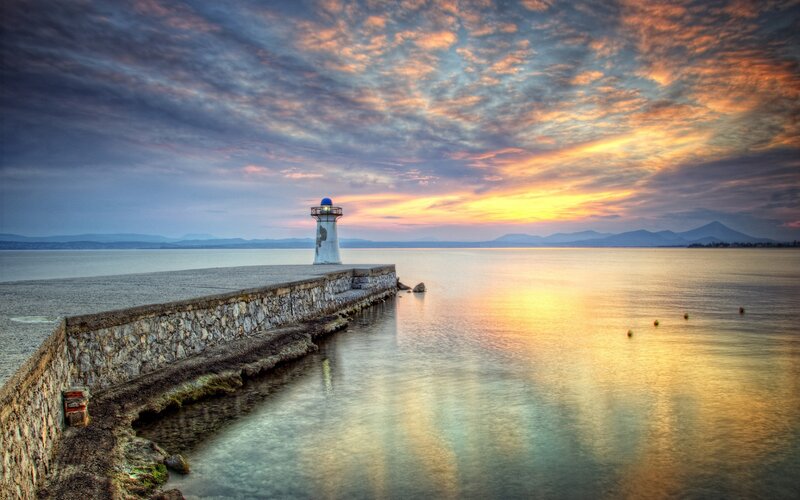Lighthouse on Pier — Orange, Serene, Sunset, Photograph