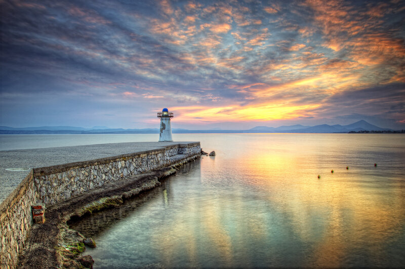 Lighthouse on Pier — Orange, Serene