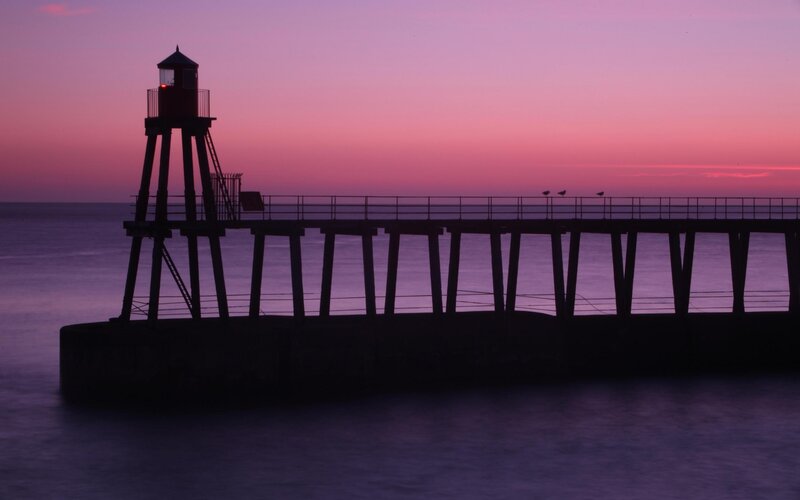Lighthouse on Pier — Purple, Serene, Sunset, Photograph, Sea, Sky
