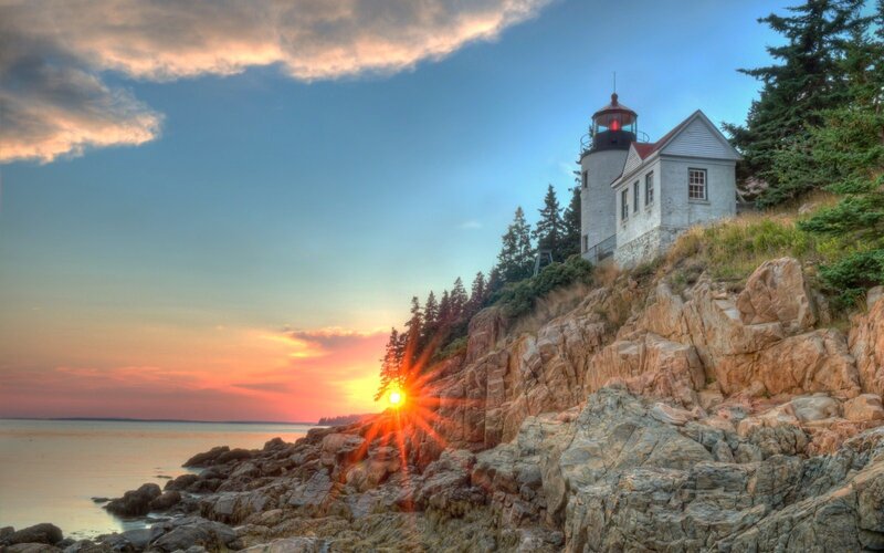Lighthouse on Rocky Cliff — Blue, Dramatic, Sunset, Photograph