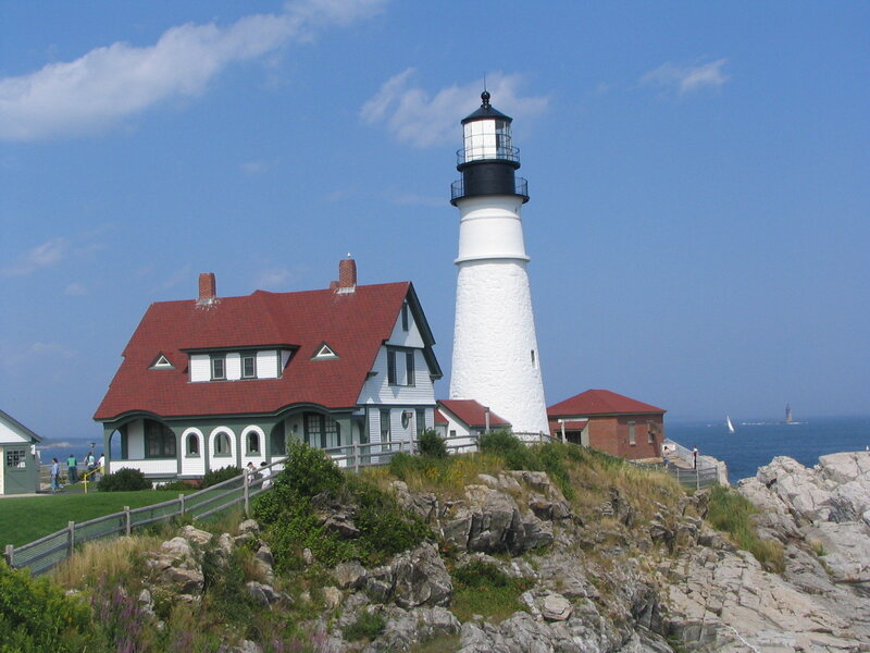 Lighthouse on Rocky Cliff — Blue, Serene, Afternoon, Photograph, House