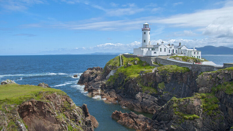 Lighthouse on Rocky Cliff — Blue, Serene, Afternoon, Photograph, Ocean, Cliffs, Buildings