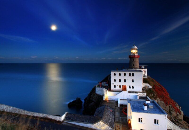 Lighthouse on Rocky Cliff — Blue, Serene, Night