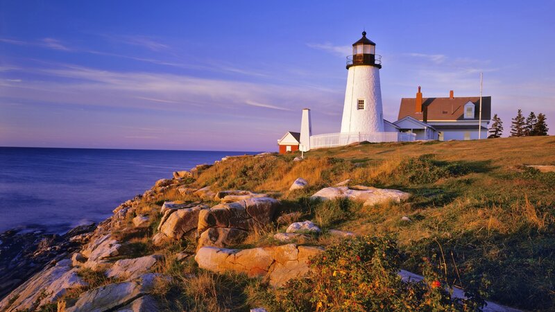 Lighthouse on Rocky Cliff — Blue, Serene, Sunset