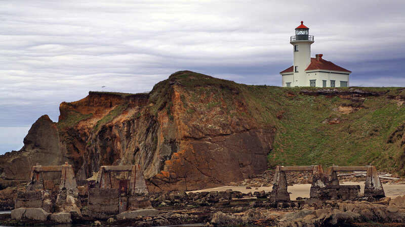 Lighthouse on Rocky Cliff — Gray, Dramatic, Afternoon