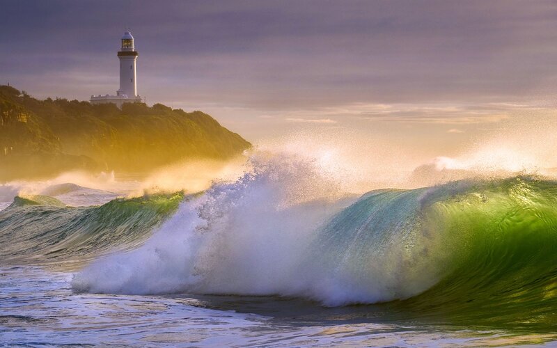 Lighthouse on Rocky Cliff — Green, Dramatic, Sunset