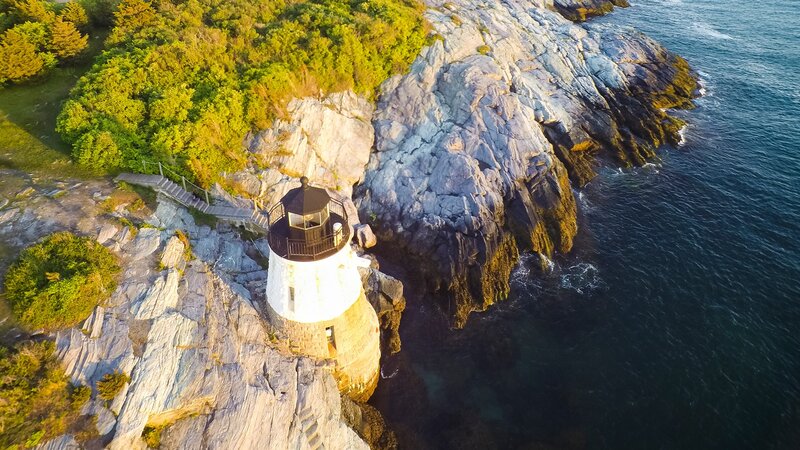 Lighthouse on Rocky Cliff — Green, Serene