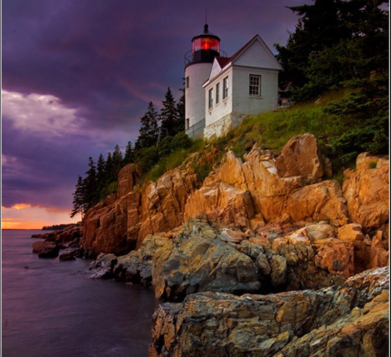 Lighthouse on Rocky Cliff — Purple, Dramatic, Sunset, Photograph