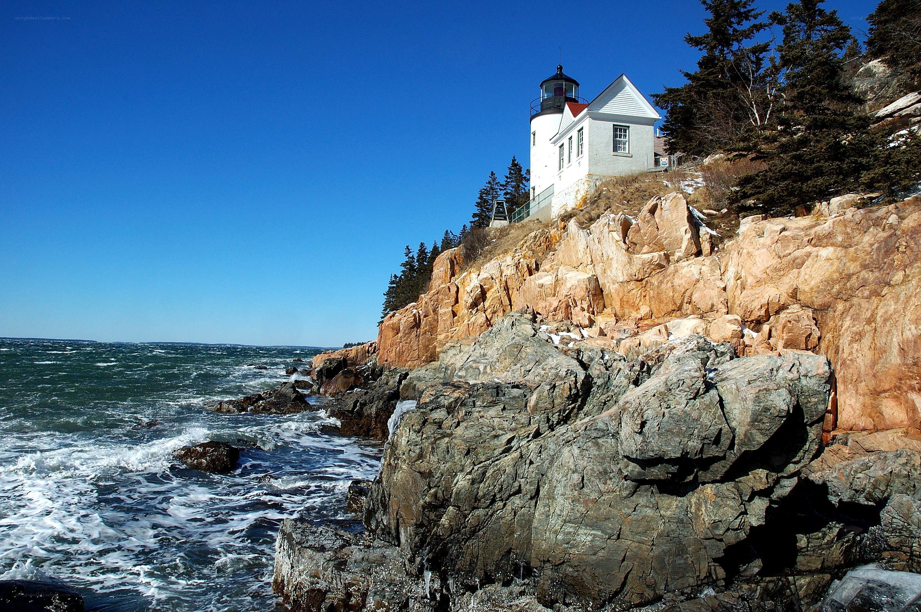 lighthouse on rocky coast