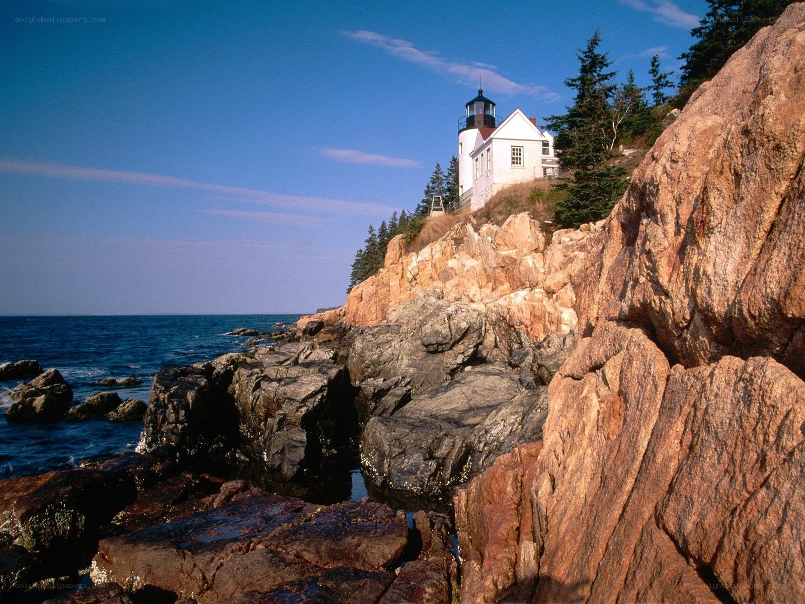 lighthouse on rocky coast