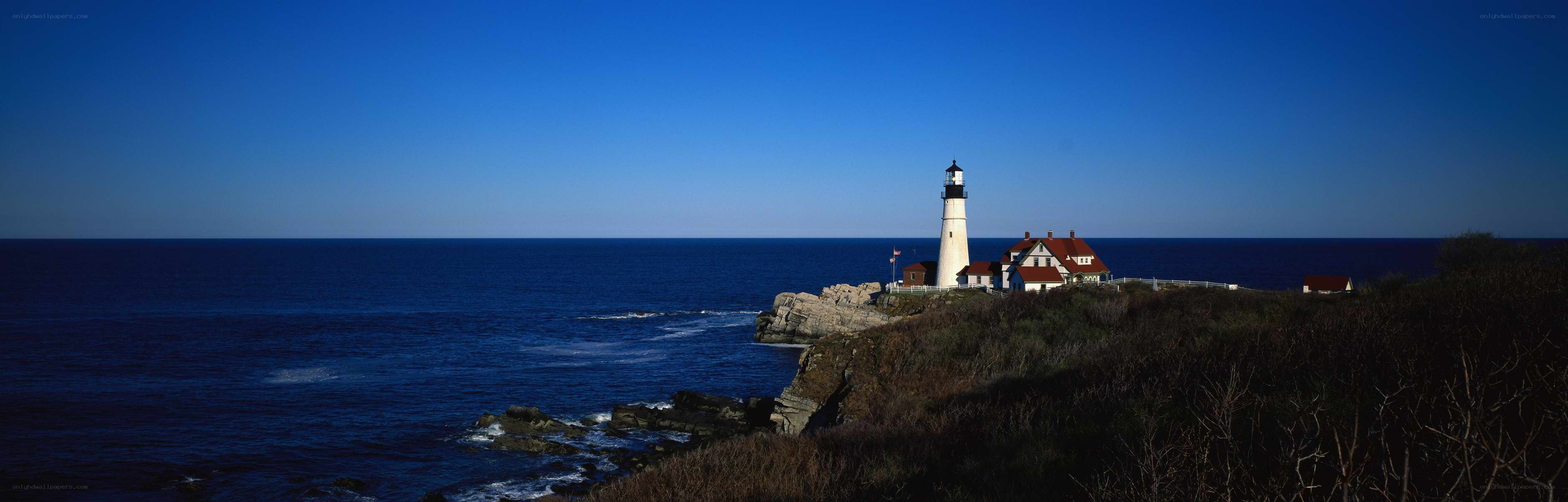 lighthouse on rocky coast