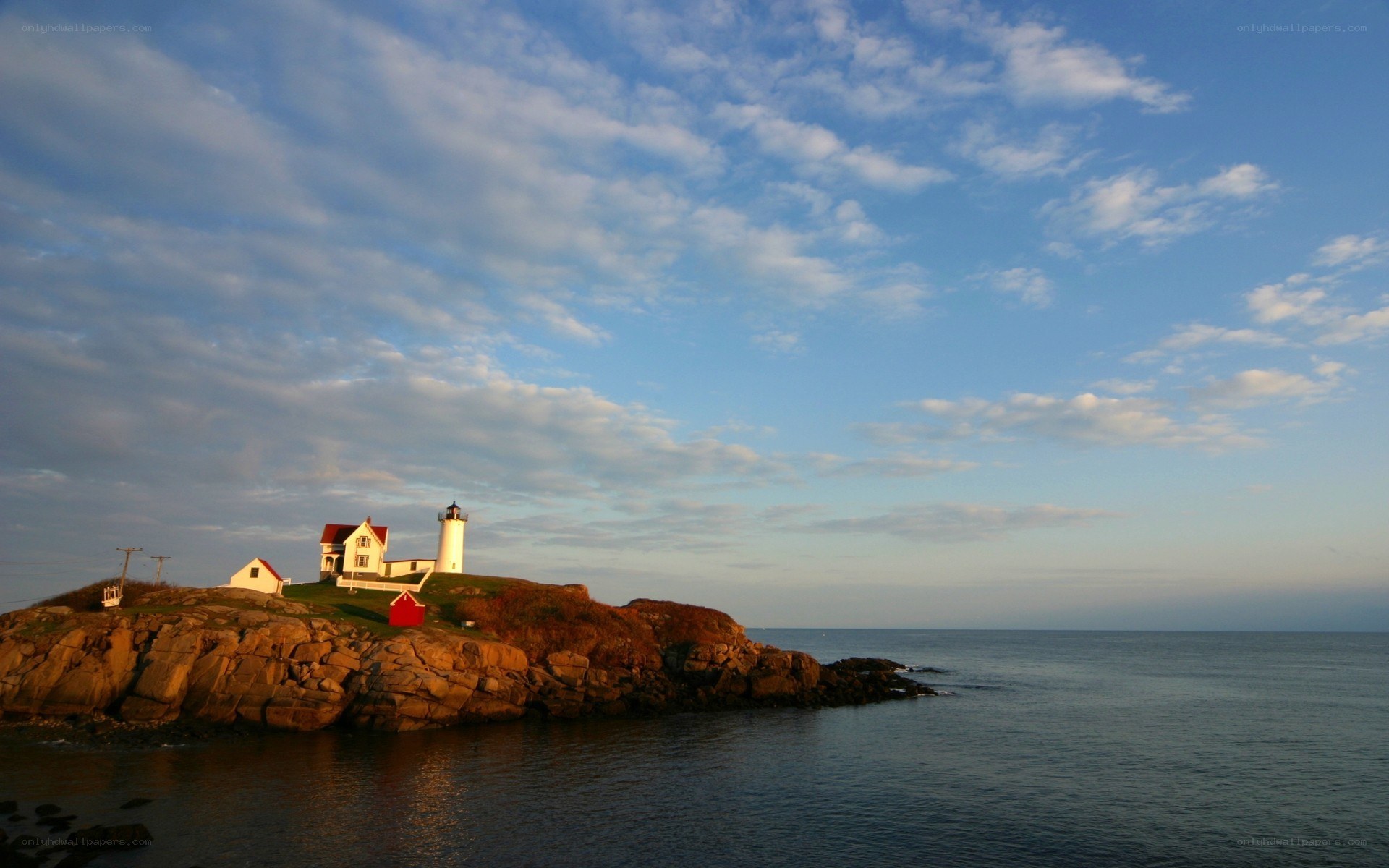 lighthouse on rocky coast