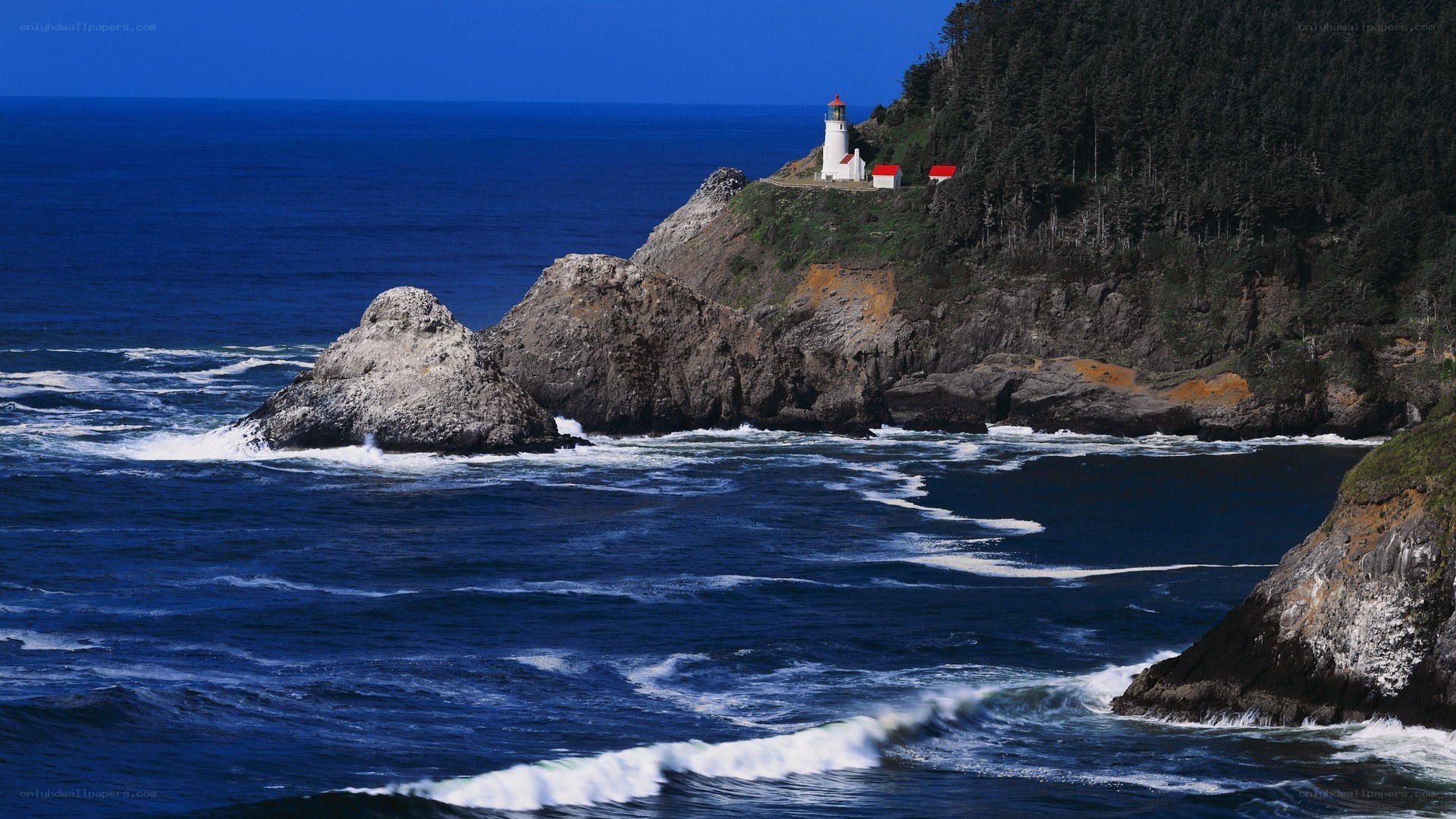 lighthouse on rocky coast