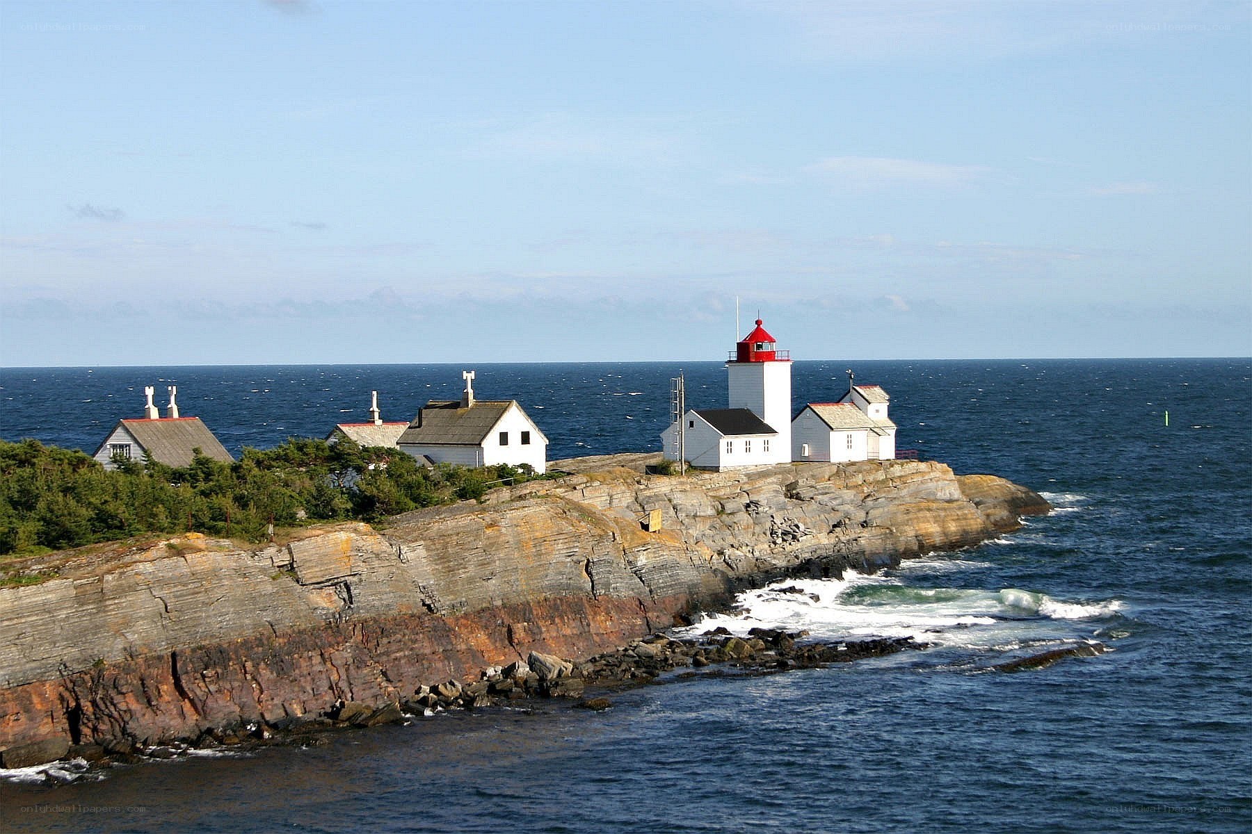 lighthouse on rocky coast