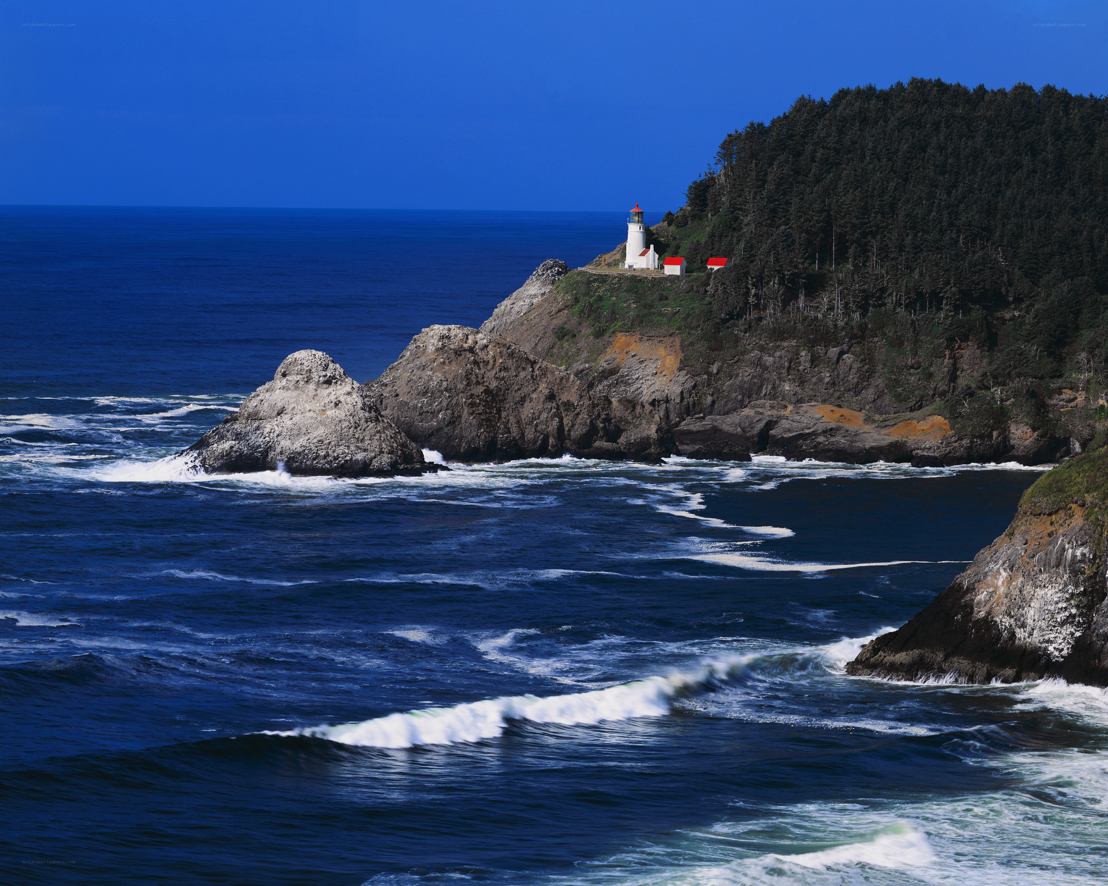 lighthouse on rocky coast