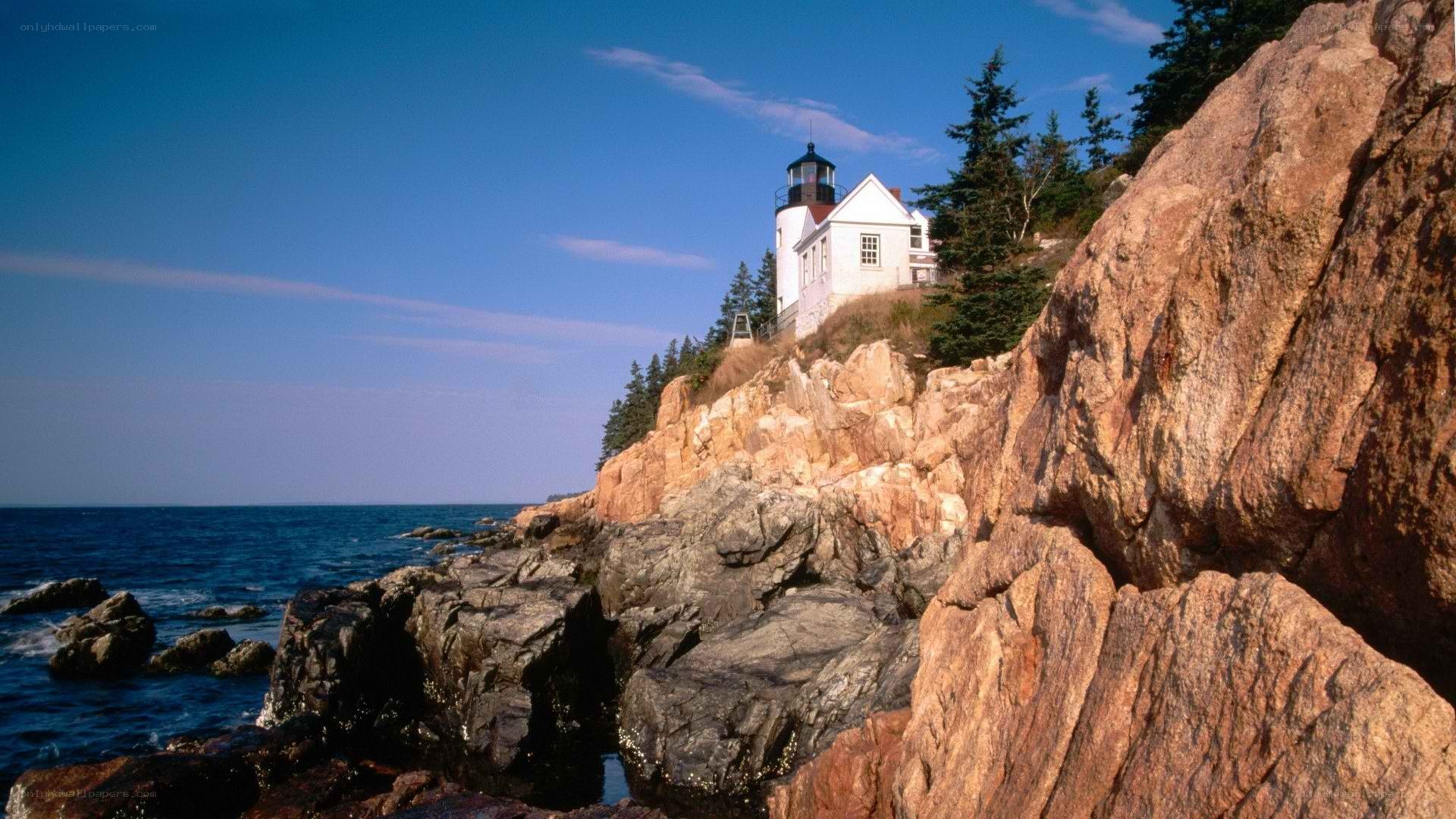 lighthouse on rocky coast
