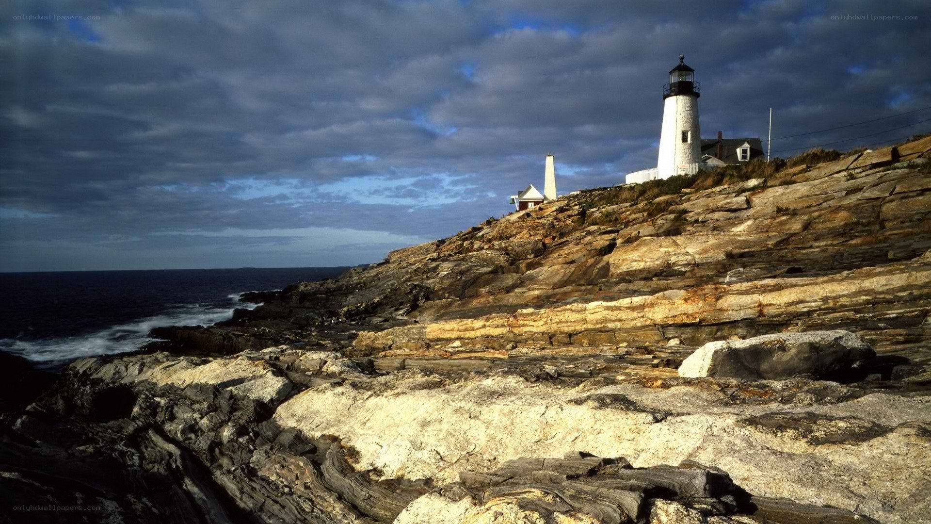 lighthouse on rocky coast