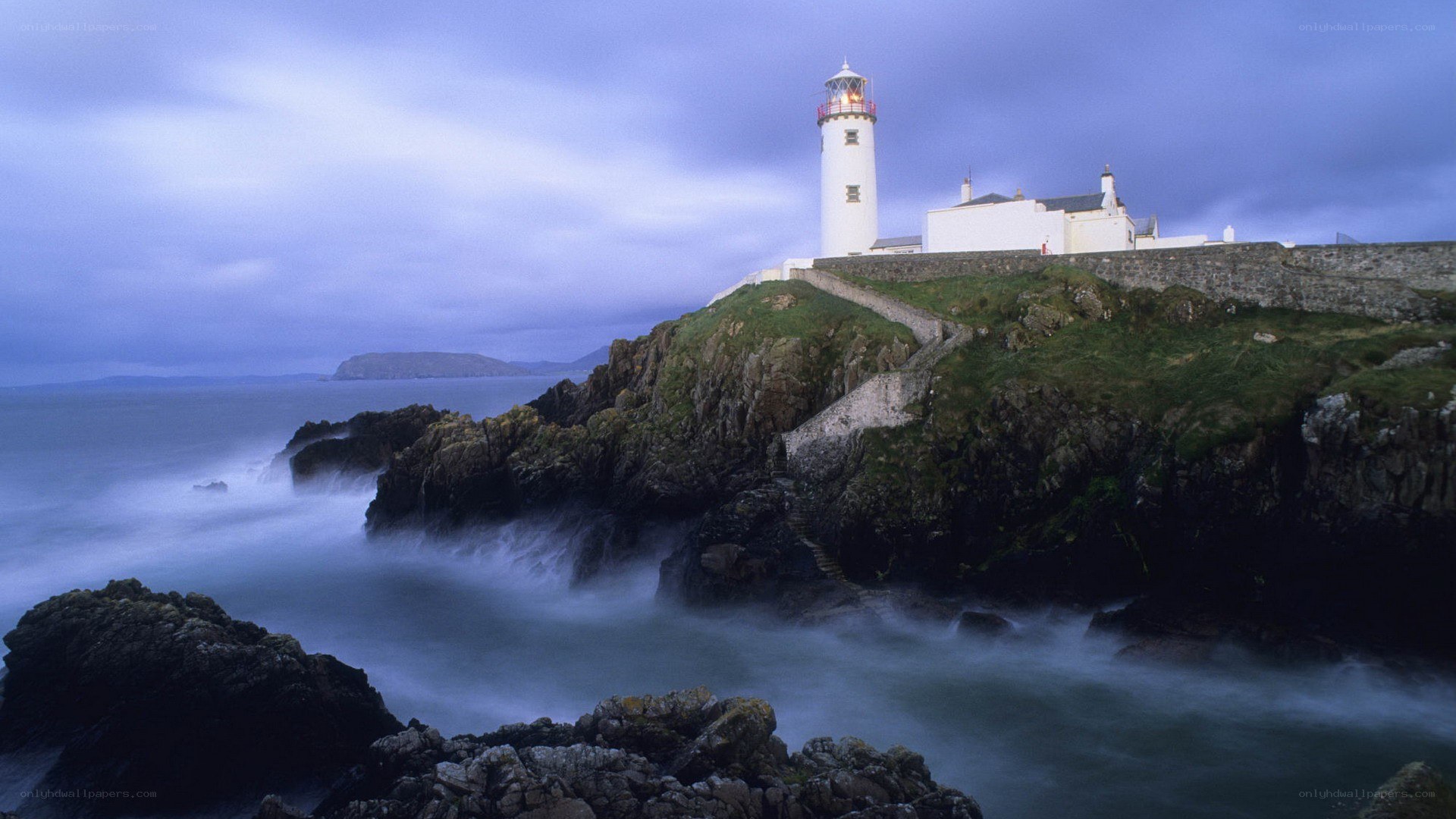 lighthouse on rocky coast