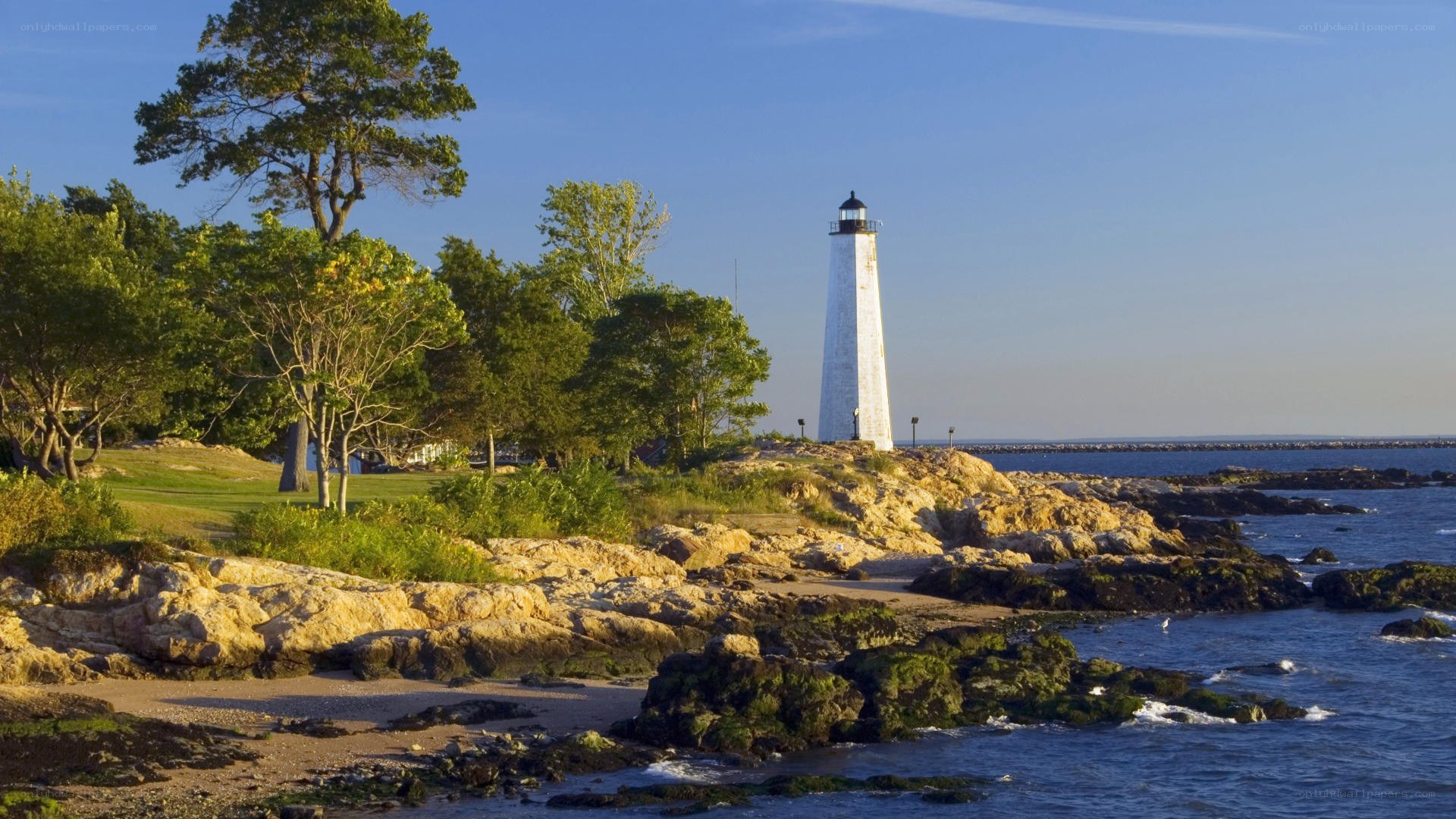 lighthouse on rocky coast