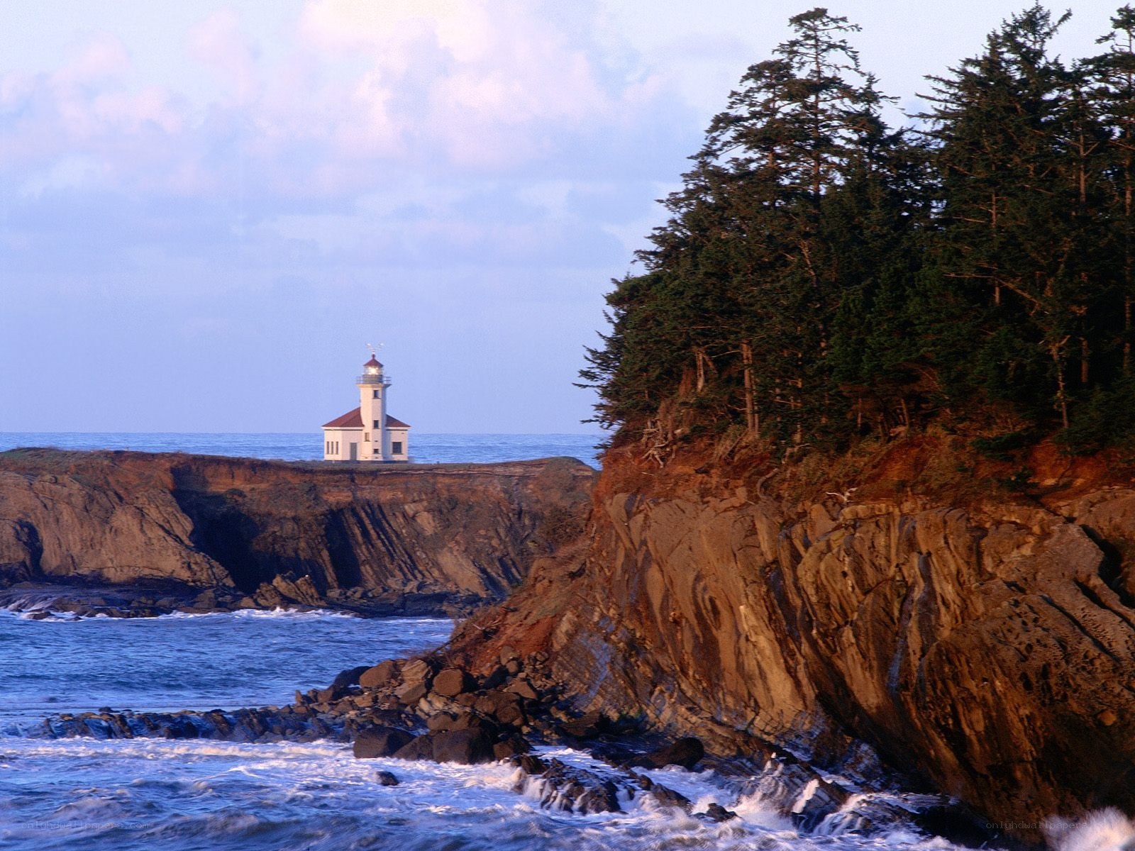 lighthouse on rocky coast
