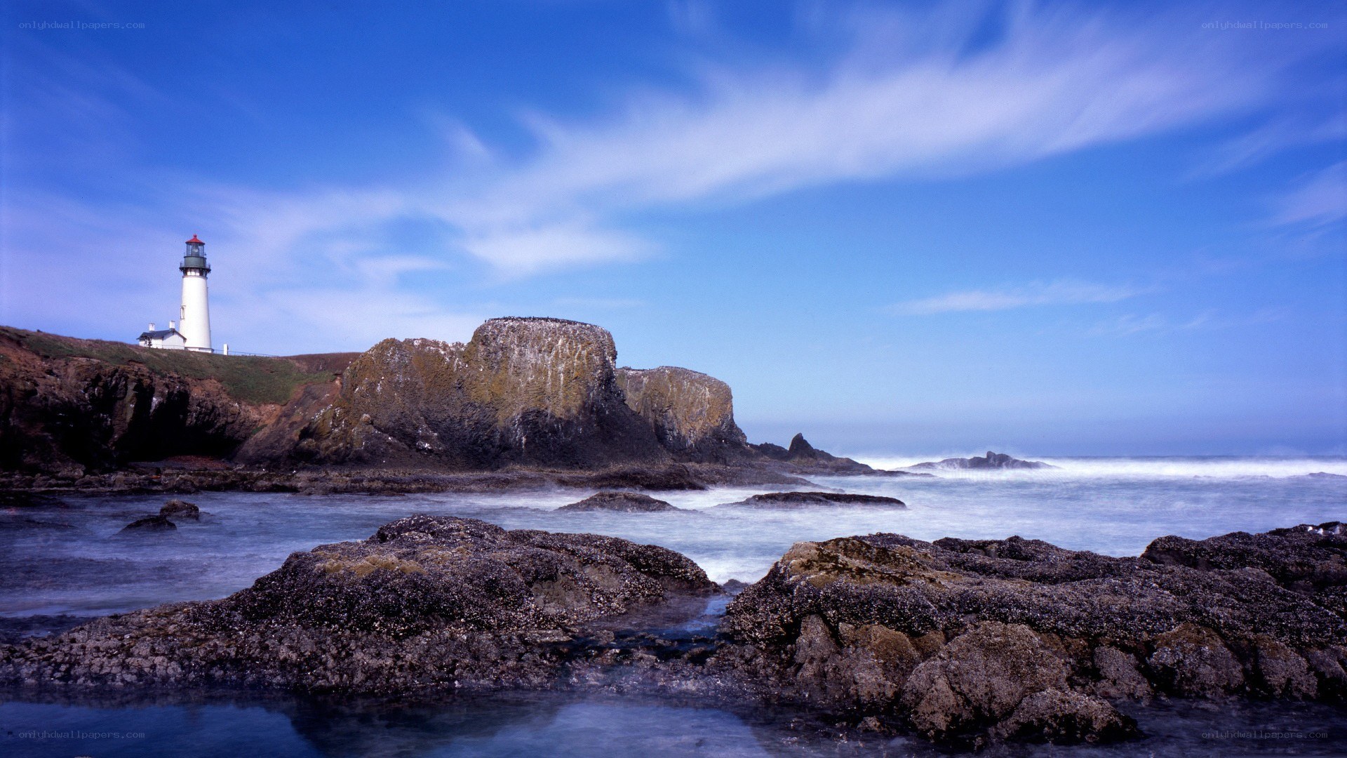 lighthouse on rocky coast