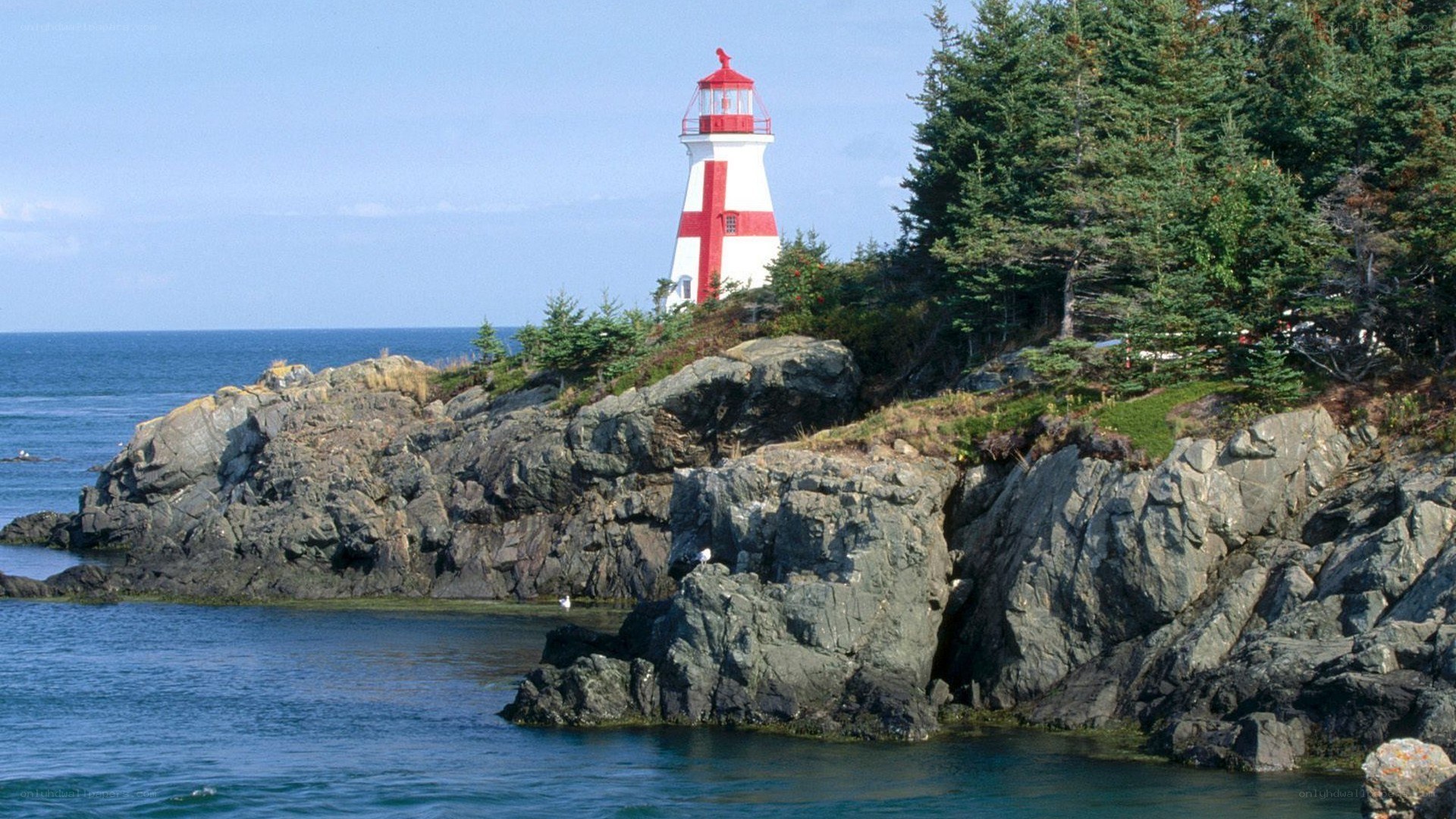 lighthouse on rocky coast