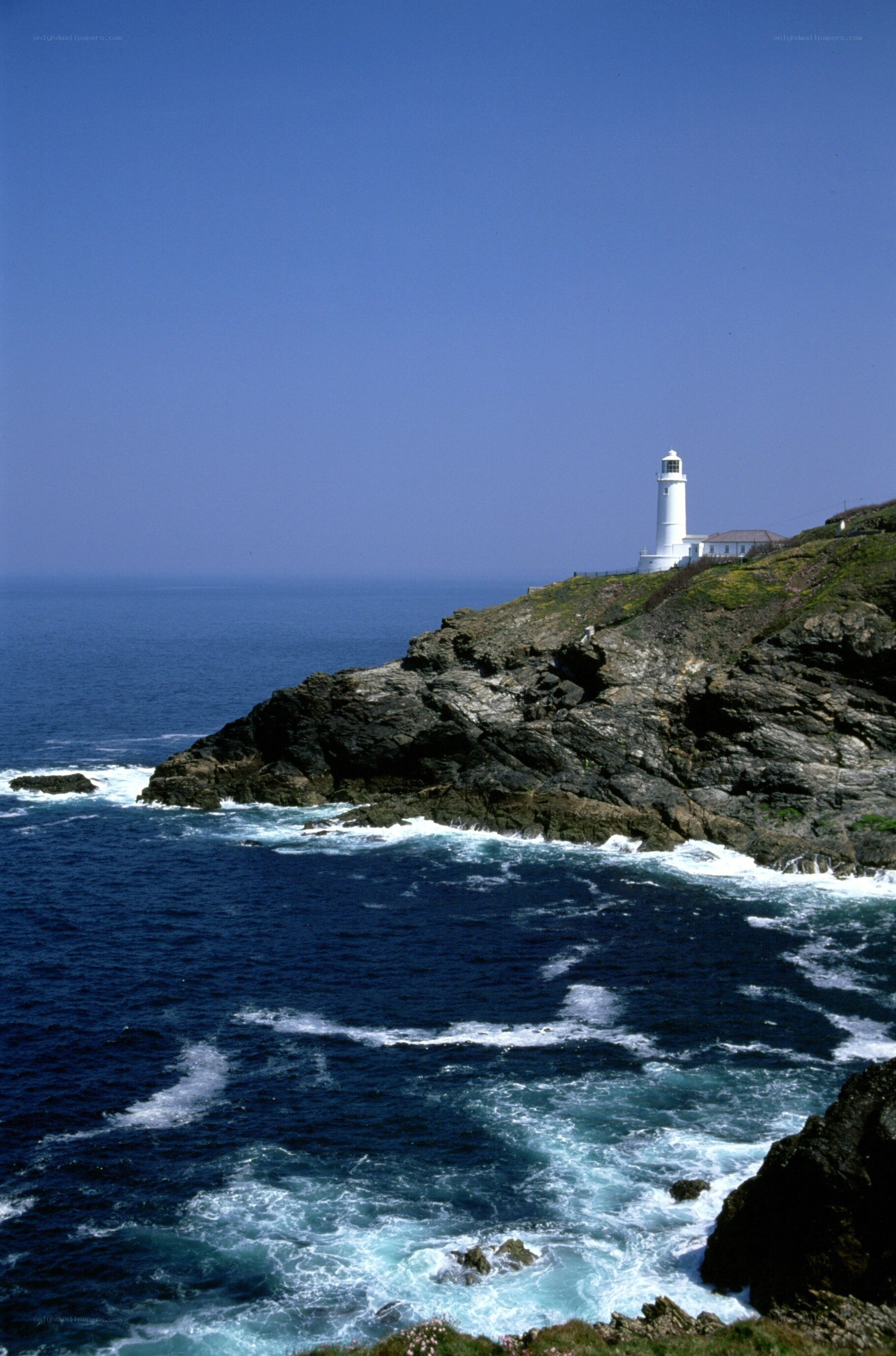 lighthouse on rocky coast