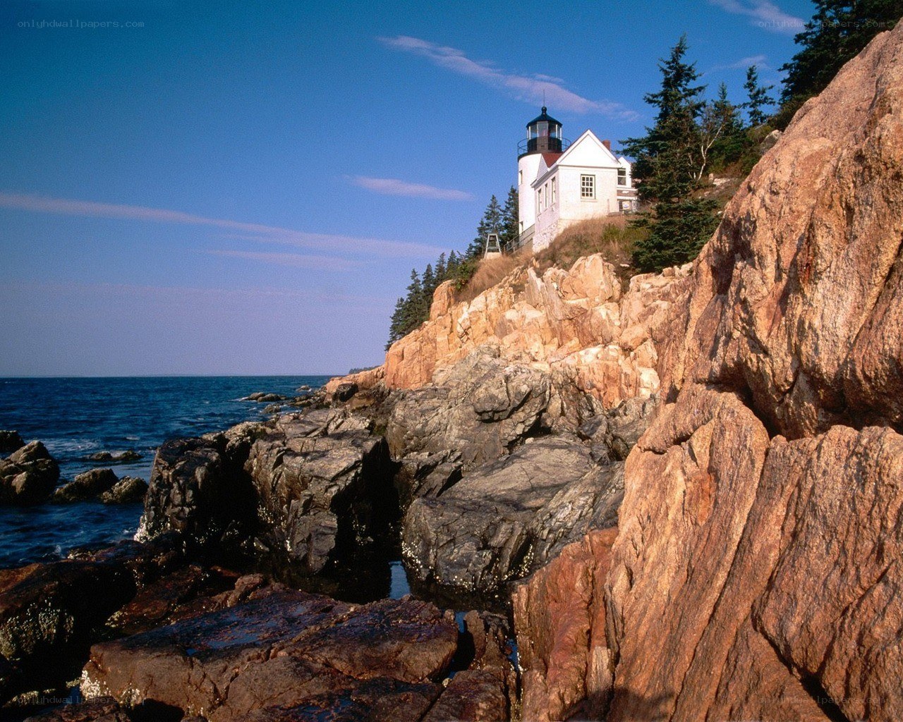 lighthouse on rocky coast