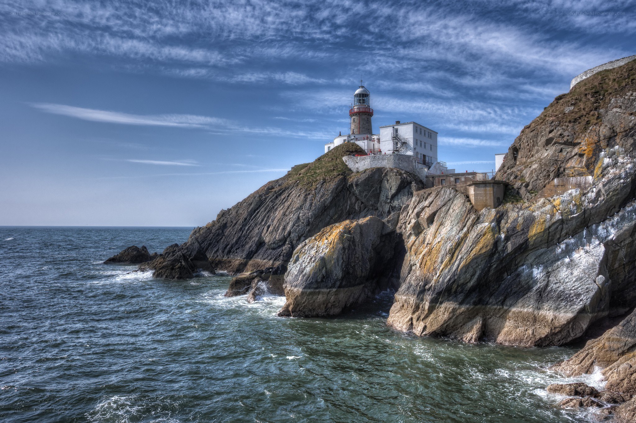 lighthouse on rocky coast